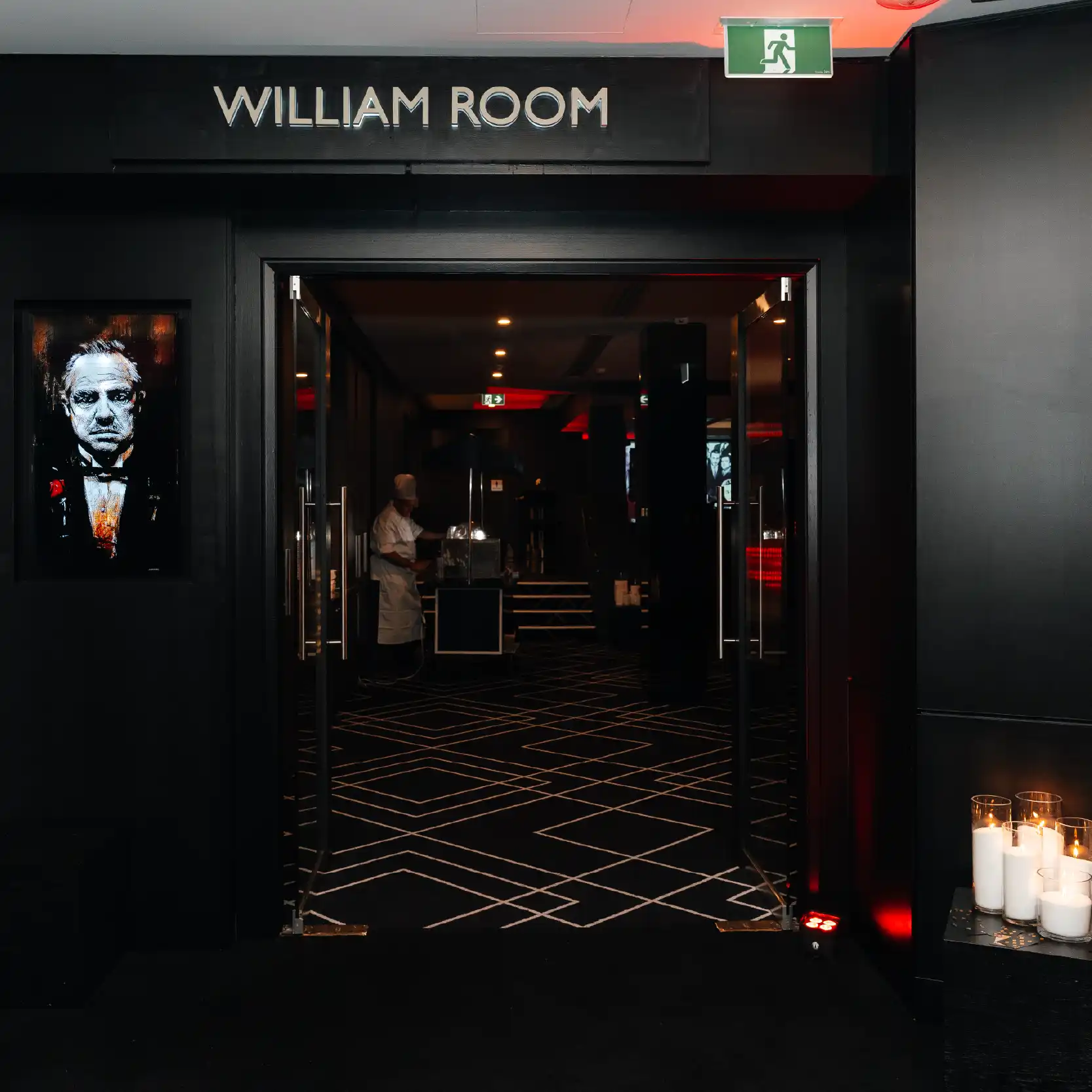 William room with God Fathers screen at the door front. Mafia theme decorated room entrance.