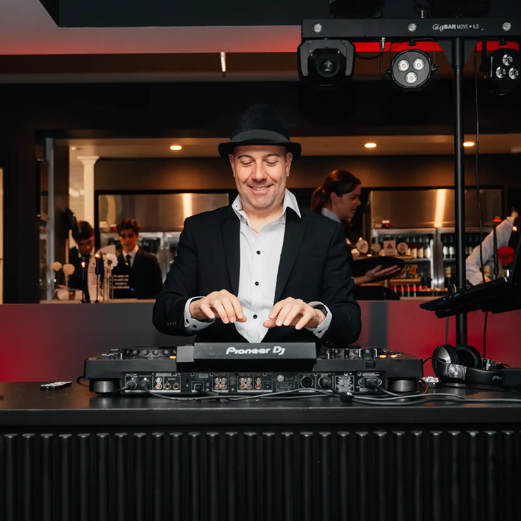 DJ standing with DJ set kit